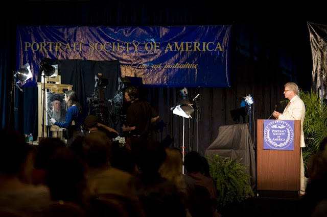 Tom Donahue at the podium annou...