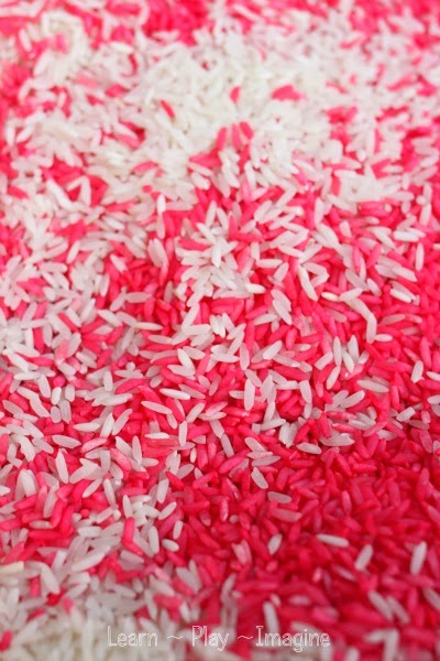 Easy to make candy cane rice for Christmas sensory play