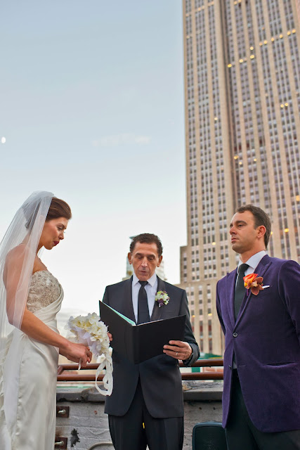 Vows on a rooftop wedding with Empire State Building