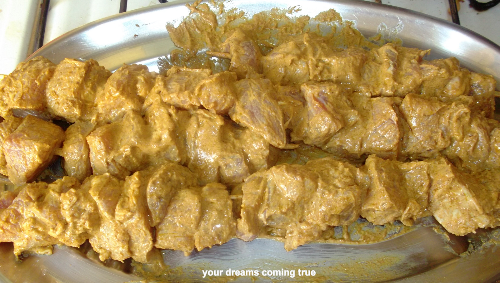 Chicken Tikka Kebabs With Cilantro, Raita On Pitta Bread.