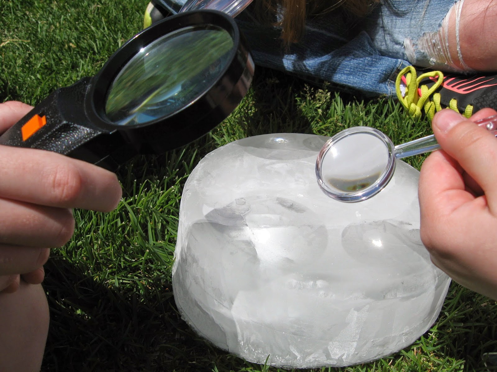 Almost Unschoolers Summer Fun 2014 Melting Ice With a Magnifying Glass