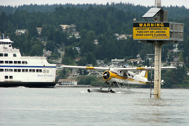 Float plane landing as ferry leaves Departure Bay (2007-08-20)