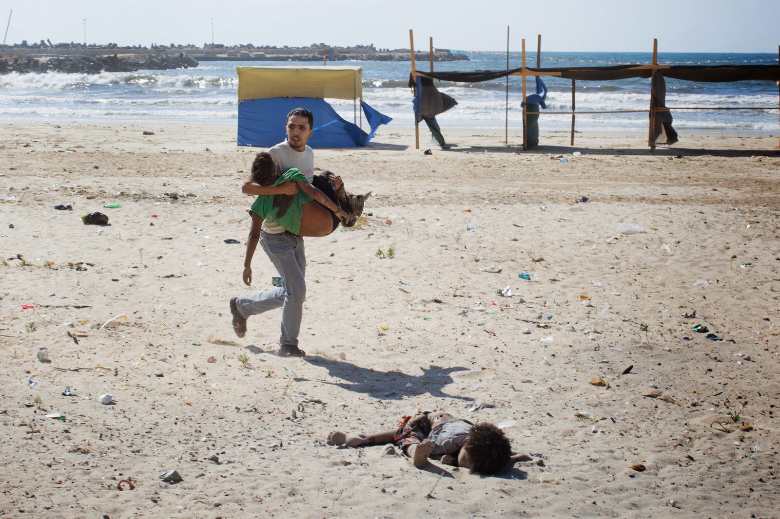 Children on a beach in Gaza, July 16 2014.
