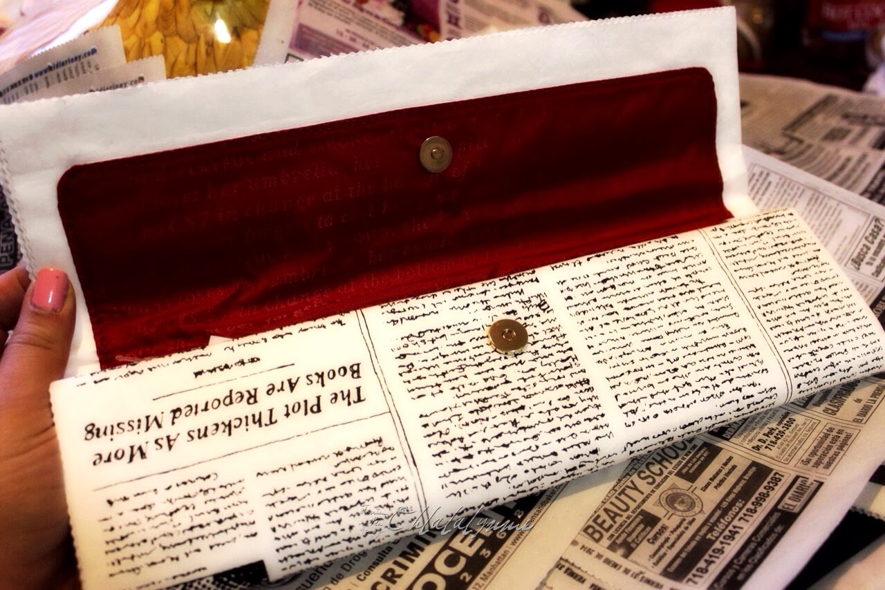 kate spade journal newspaper clutch