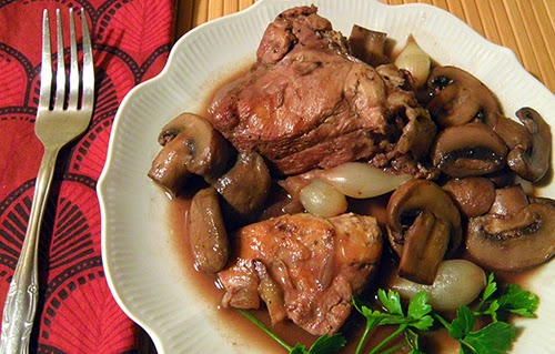 Plate of Coq Au Vin with Parsley garnish