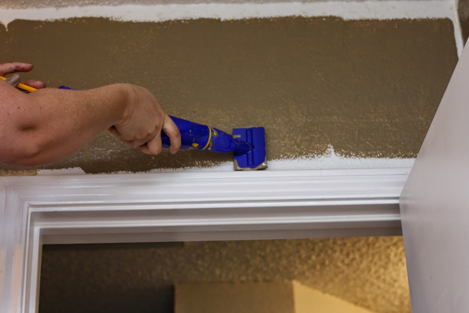 Now for those edges and up near the ceiling, this handy dandy Quick