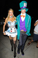 Paris Hilton and River Viiperi as  Alice and Mad Hatter