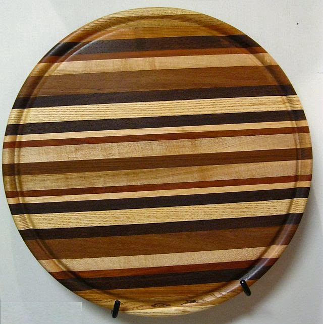 The Joyful Jewel Orlan Johnson "Large Round Cutting Board" at the