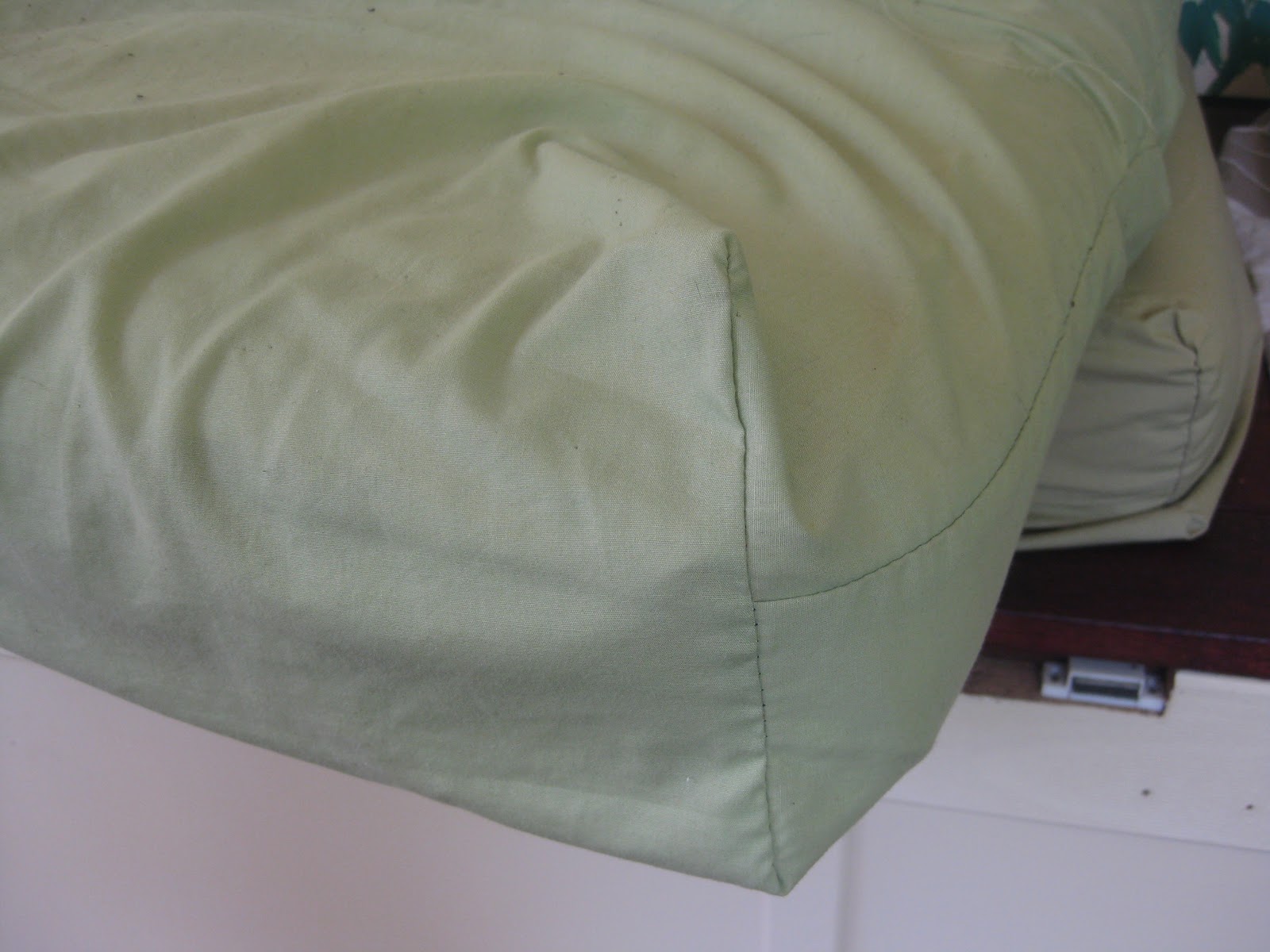 Recovering an old couch cushion, cheaply!