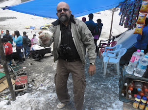 Playing with ice in June at Sonamarg .