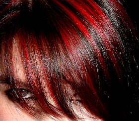 black hair red highlights guy
