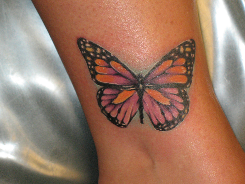 Ankle butterfly tattoo
