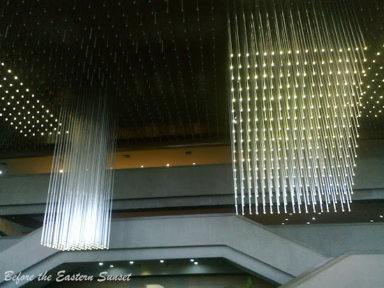 Hanging lights inside the PICC lobby.