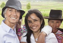 Lima UNFCCC COP 20: Christine Lagarde & Nadine Heredia posing with smiling native women near Ayacucho.