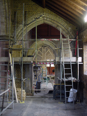 Completed stone arch and hood moulding now the brickwork is filling in the walls