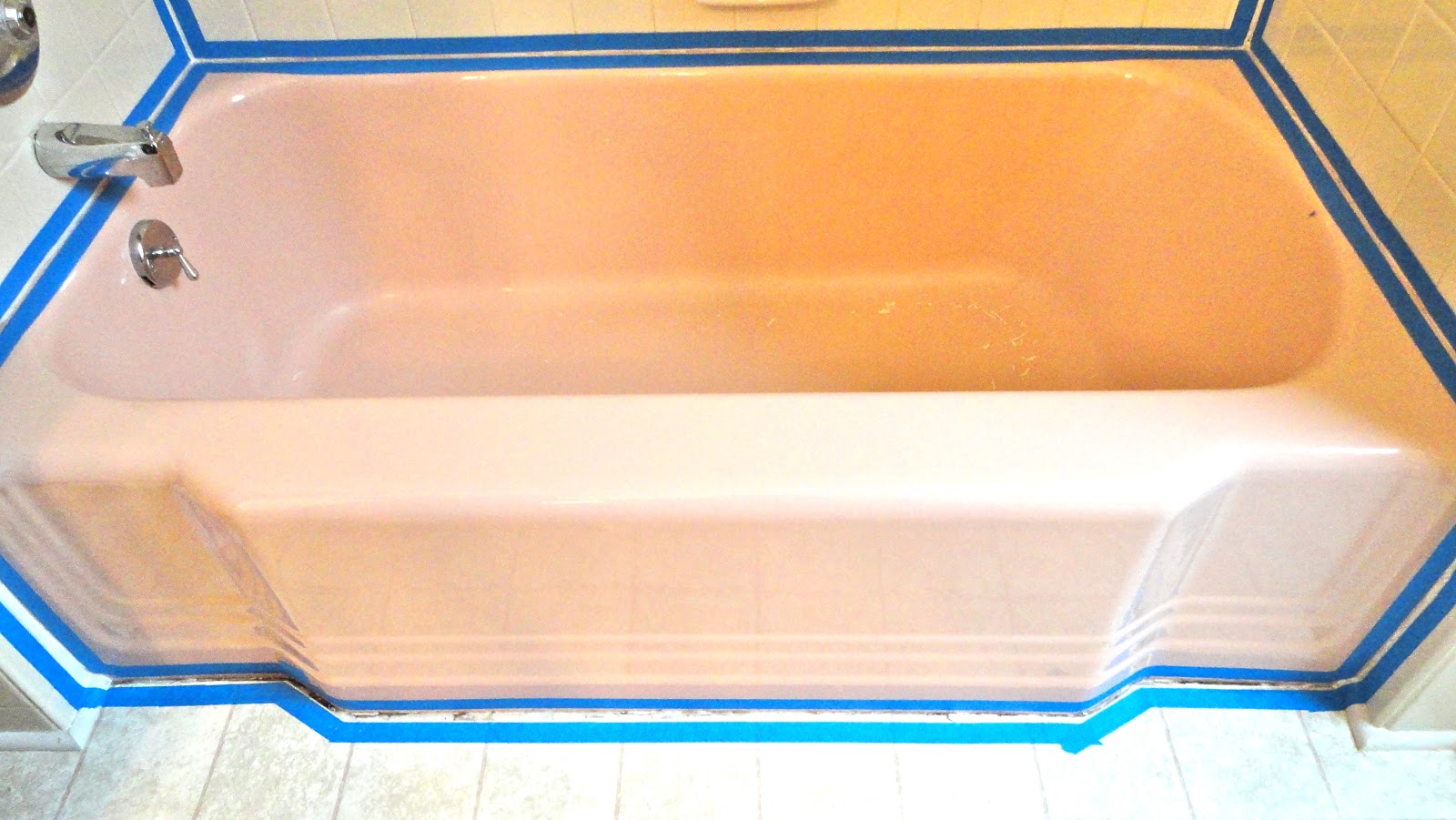 Eclectified Living Recaulking the bathtub