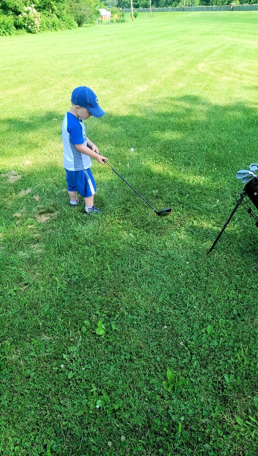 A Little Boy in A Large Fairway