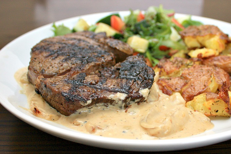 APPLE A DAY Grilled Ribeyes with Caramelized OnionBleu Cheese Sauce