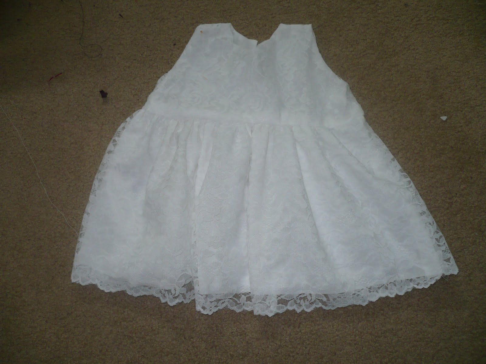 Sew on a button/snap/velcro at the slit you made at the back for closure.