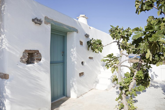 A small white house in Antiparos island in Cyclades, Greece designed by VOIS Architects. Photo by Yorgos Kordakis. See more at www.grecianparadise.com  