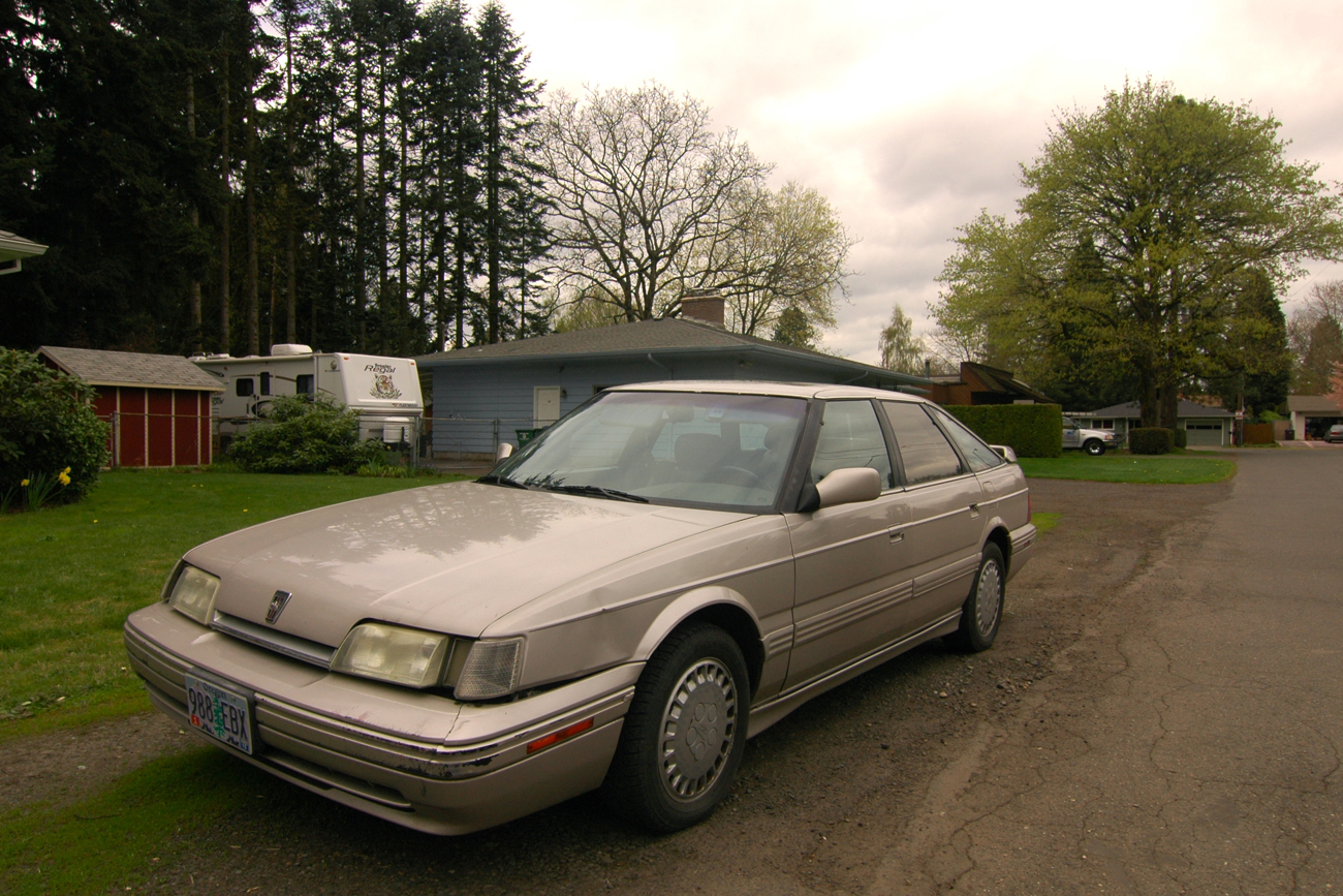 OLD PARKED CARS. 1989 Sterling 827 SLi Fastback.