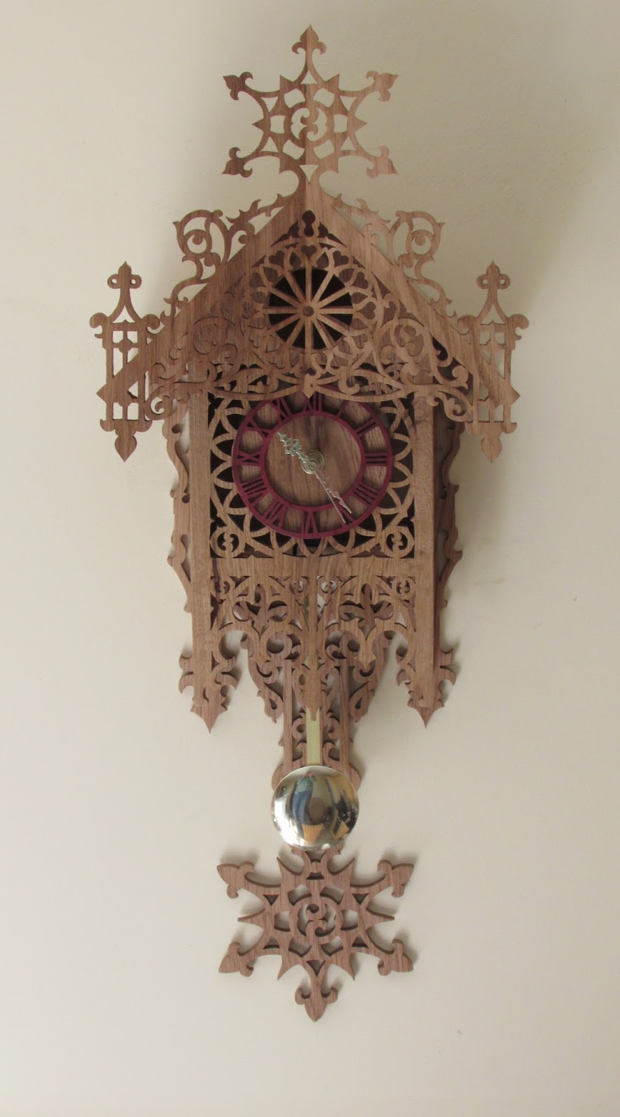 Oilgate Woodcraft Fretwork Wall Clock.
