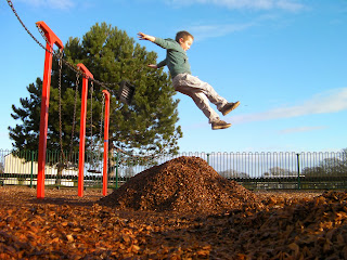 mountain of wood chips for soft landing flying through the air