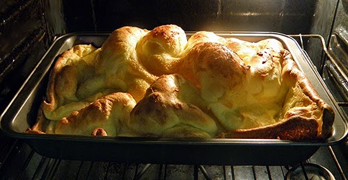 Giant Contorted Popover Pancake Puffs up as it Bakes