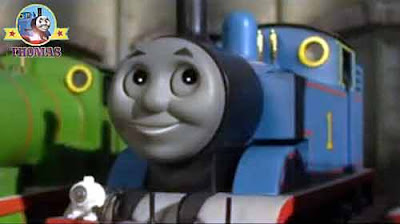 Thomas and his friends Gordon at the Island of Sodor roundhouse Thomas the train with a cheeky smile