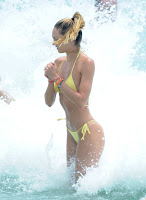 Candice Swanepoel  spashing in the water