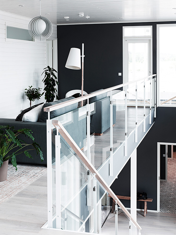 Eclectic finnish home with black walls. Photo by Krista Keltanen