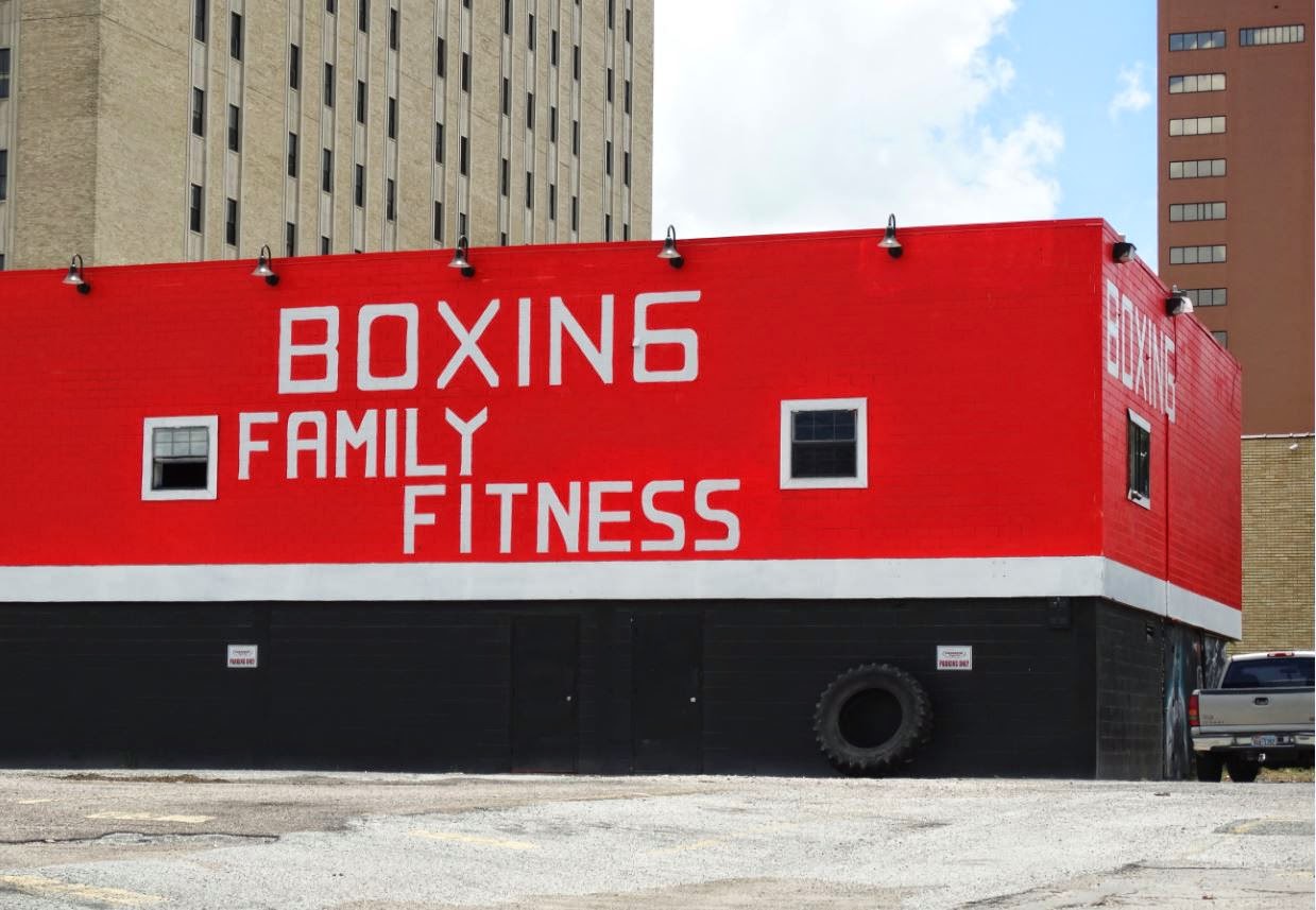Houston in Pics Main Boxing Gym Bright red fitness venue Downtown (formerly with murals