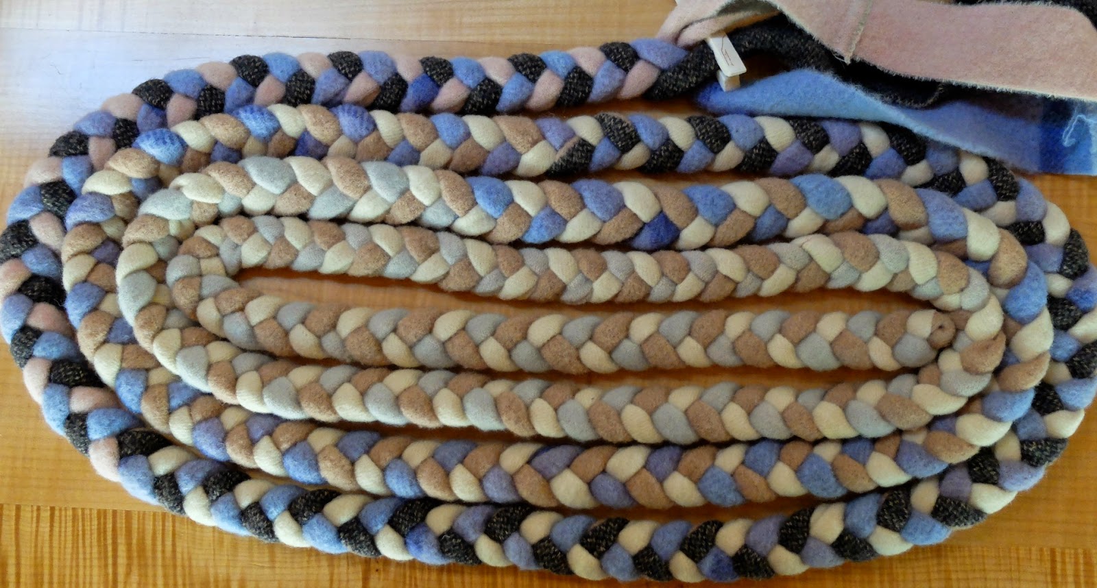 a braided rug for a cosy corner rubber boots and elf shoes