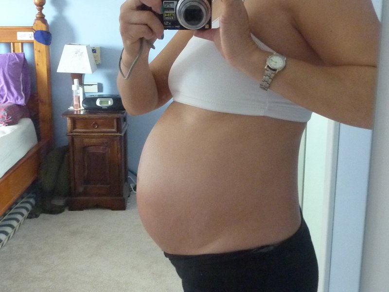 What does a woman look like when she is three to four months pregnant?