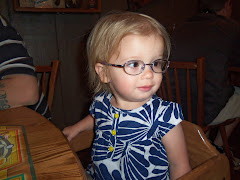 Stella with her glasses on.