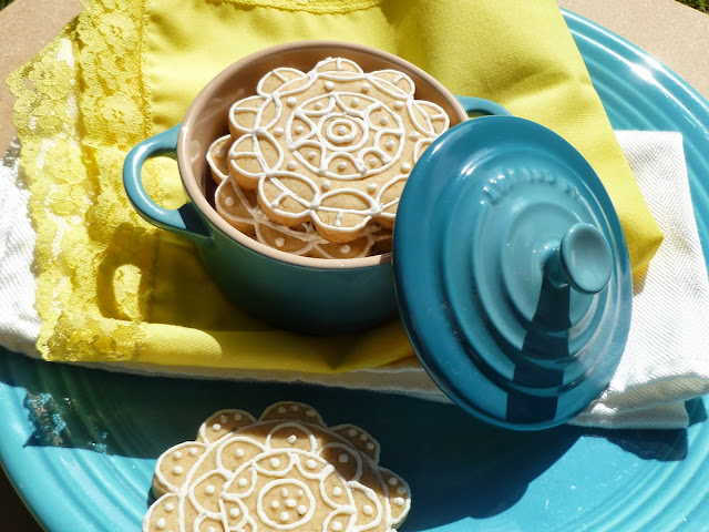 carribean blue le creuset cocotte with lemon-rosemary tea biscuits and bright yellow napkin