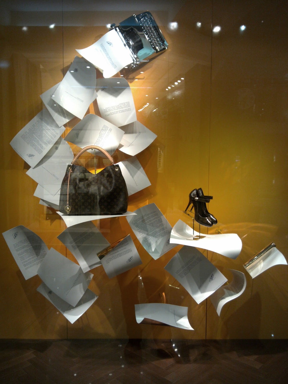Louis Vuitton Floating Papers Window Display - Best Window Displays