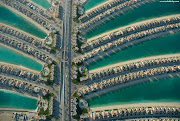 A Palm Jumeirah irá concluir 2.000 moradias, cerca de 40 hotéis de luxo, . (palm island)