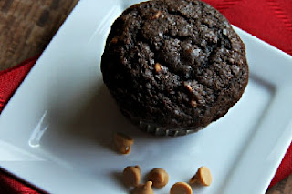 chocolate muffins with peanut butter chips on a plate