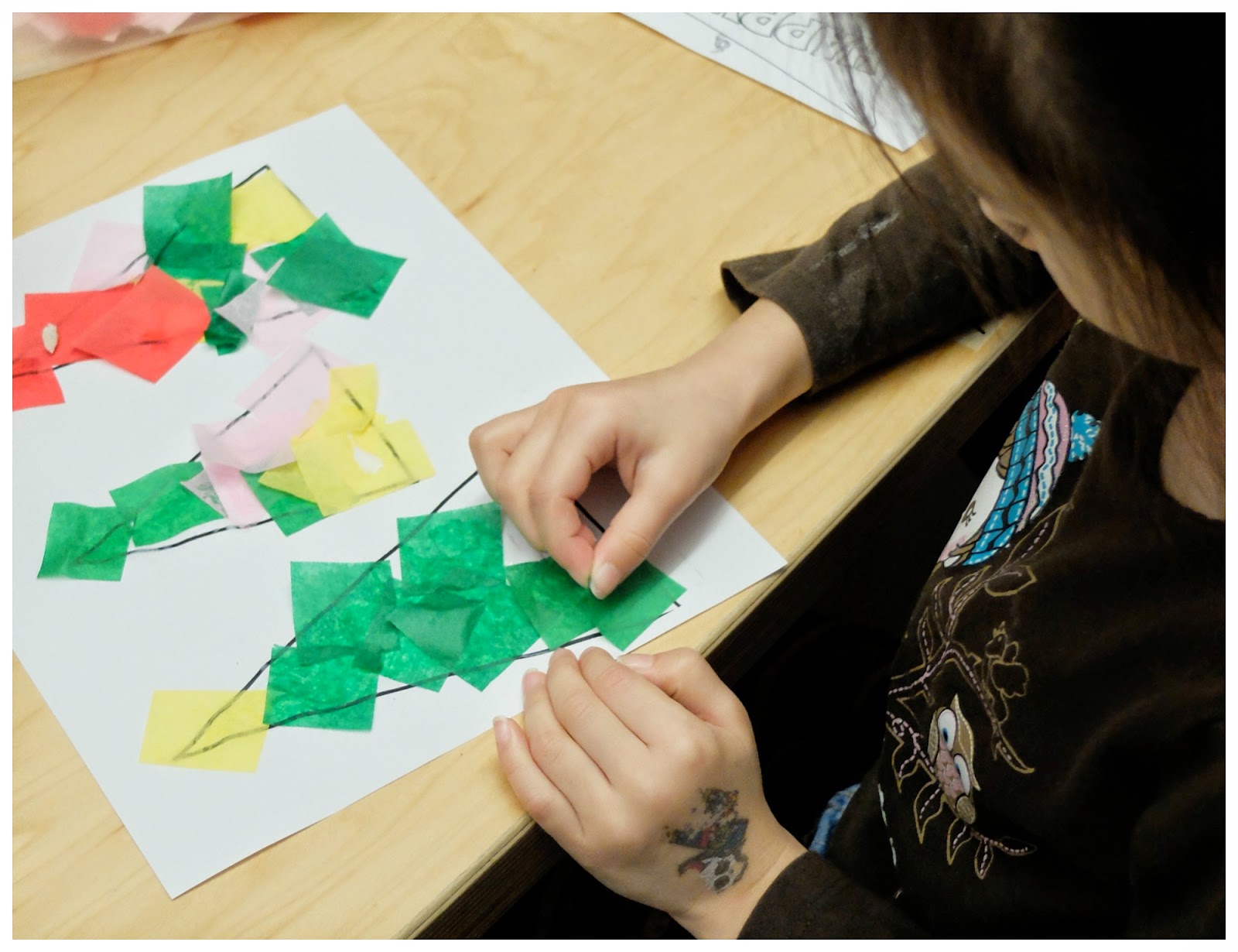 colourful tissue paper winter trees rubber boots and elf shoes