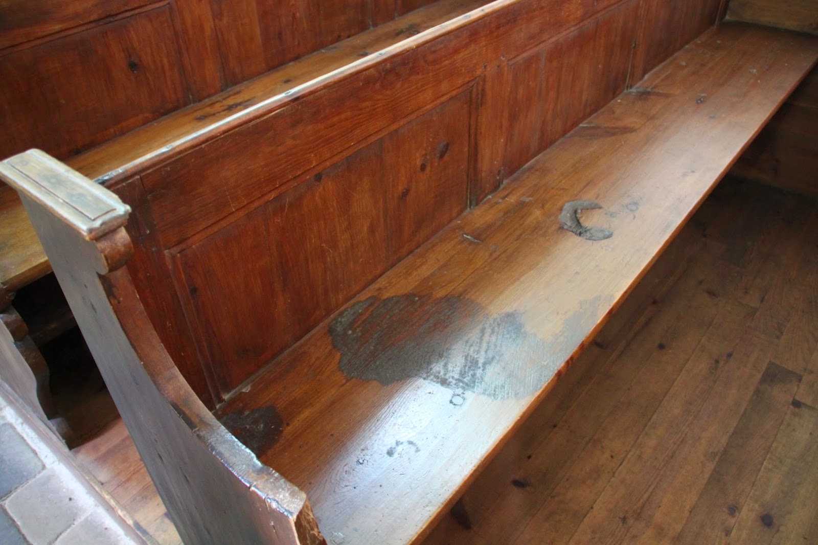 blood-stained pew at World War II church