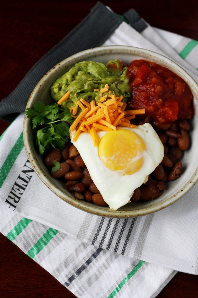 Mango & Tomato Vegetarian Pinto Beans Breakfast Bowl With A Fried Egg