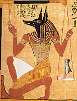 anubis weighing a heart against the feather of Maat