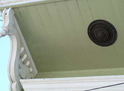 decorative soffit vent and bracket on house in New Orleans