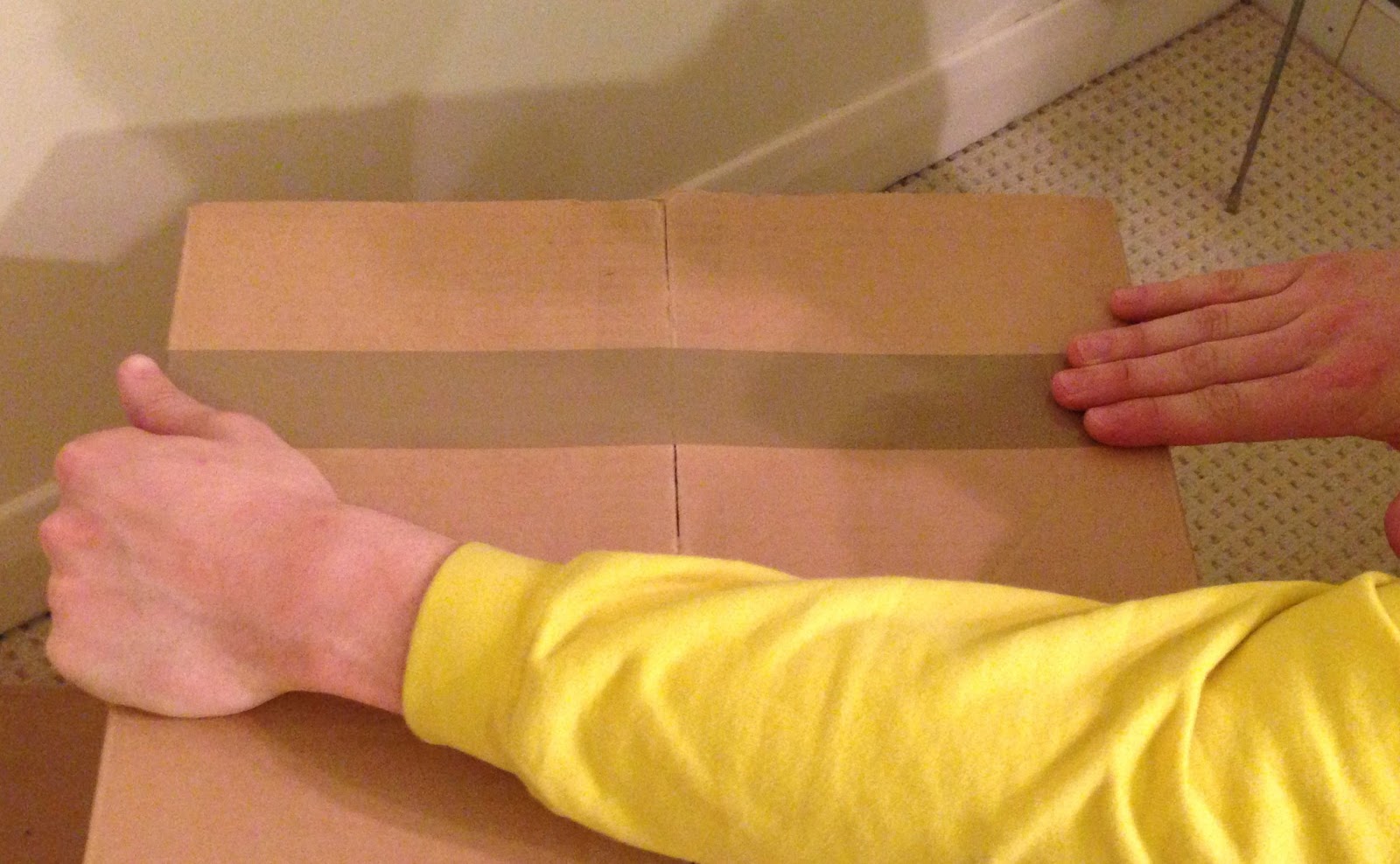 How to tape up a box for removals We Like 2 Move It Removals Hereford