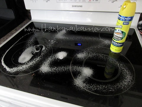cleaning a stove top