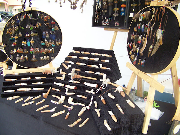 Hand-  carved pipes and hand-made jewelry