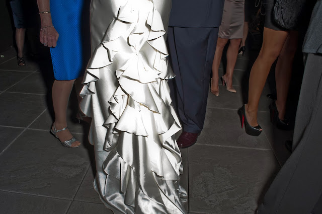 Bustled wedding dress on the roof.