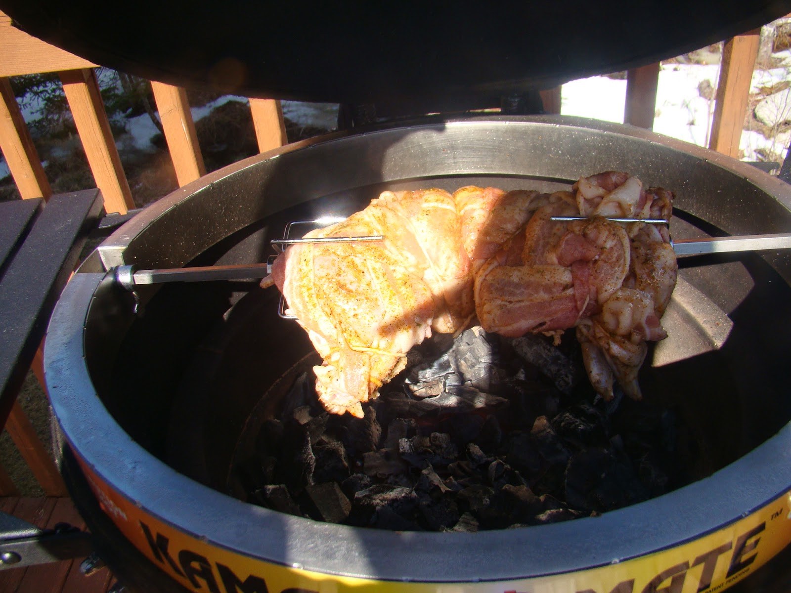 HRM CREATIVE BBQ Bacon wrapped Rotisserie Rabbit on the BBQ