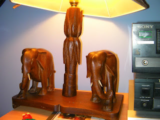 african made wooden elephant and palm tree pedestal lamp